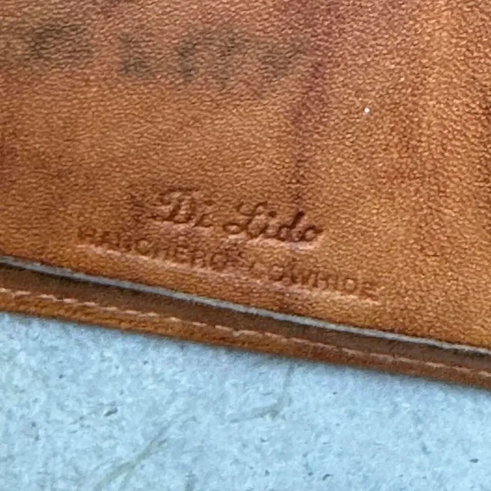 Brown cowhide leather wallet with a vintage vibe